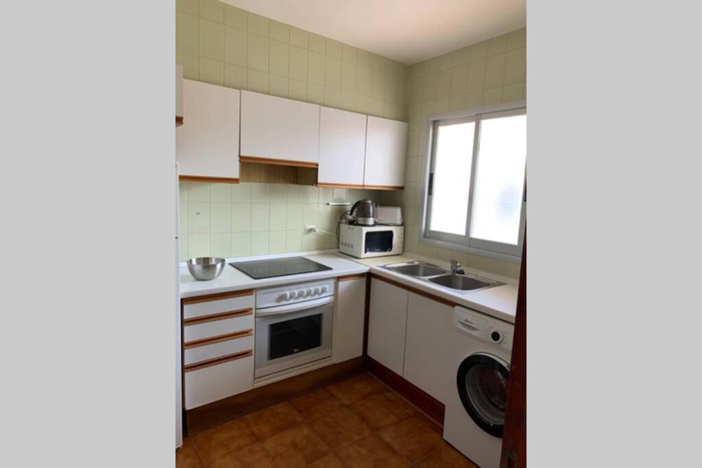 Apartamento En Playa Santo Tomas 1-5 Es Migjorn Gran Bagian luar foto
